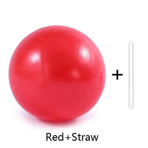 Pelota de Pilates roja con pajita.
