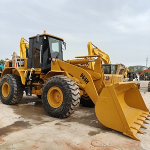CAT 966H многофункциональный погрузчик номинальная нагрузка 6 тонн мощность двигателя 195 кВт уникальные особенности