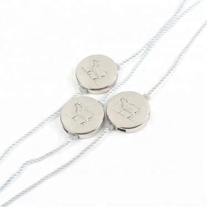 Precio directo de fábrica personalizado en relieve Animal logotipo textura Metal Etiqueta de sello de ropa - Product Image 1