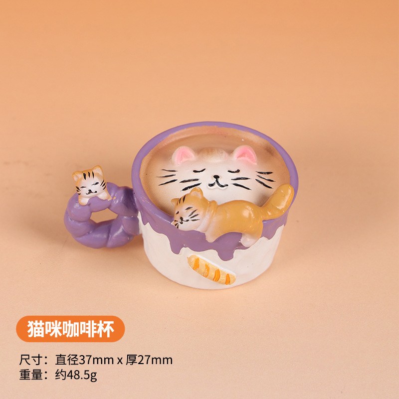 Taza de café con diseño de gato.