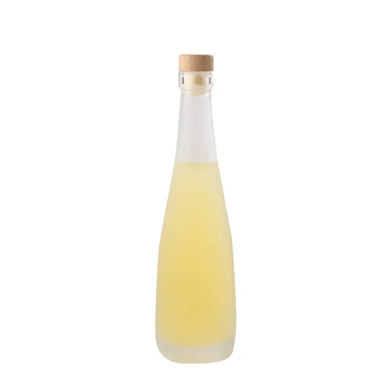 Botella de rugby Premium 330ml Vidrio de gota de agua Boca de seda esmerilada transparente Botella de embalaje de vino de fruta comercial