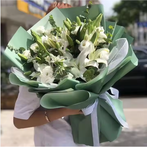 批发定制环保圣诞生物降解包装涂层PE纸浆花圣诞印花礼品包装