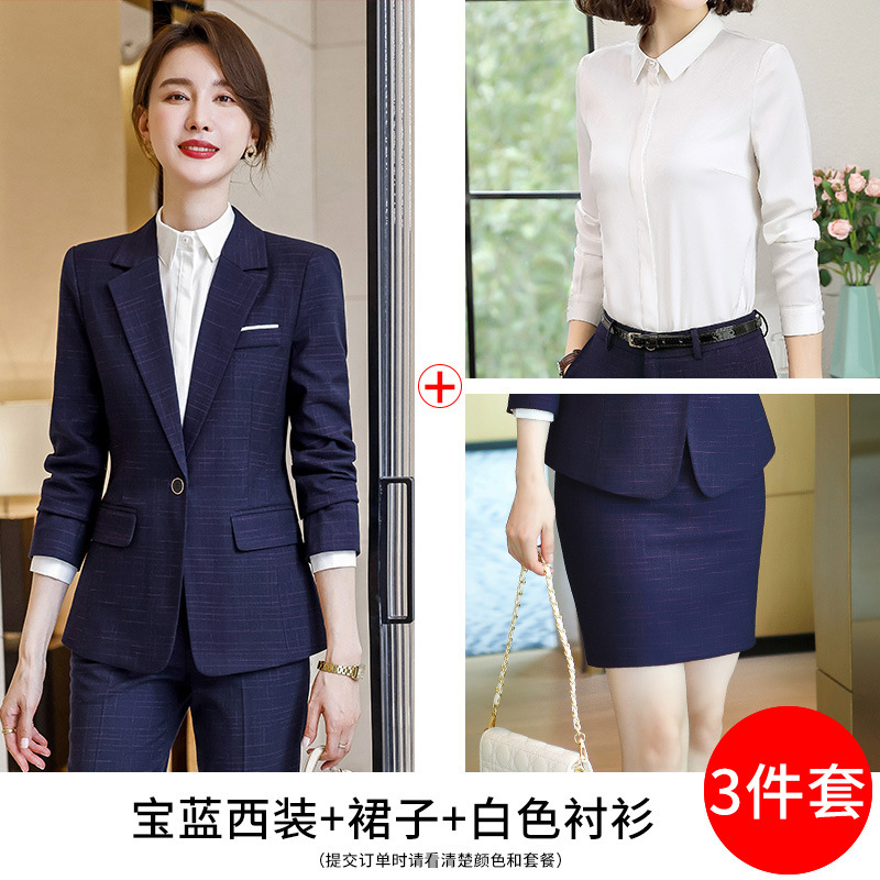 Royal blue suit, white shirt, and short skirt