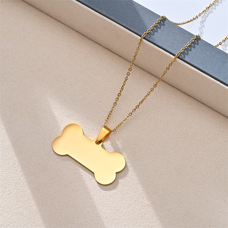 Pendentif chaîne 04X50, os de chien 2.0X3.9mm, doré.