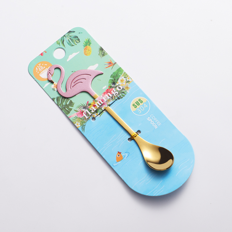 Cuchara de oro rosa con tarjeta