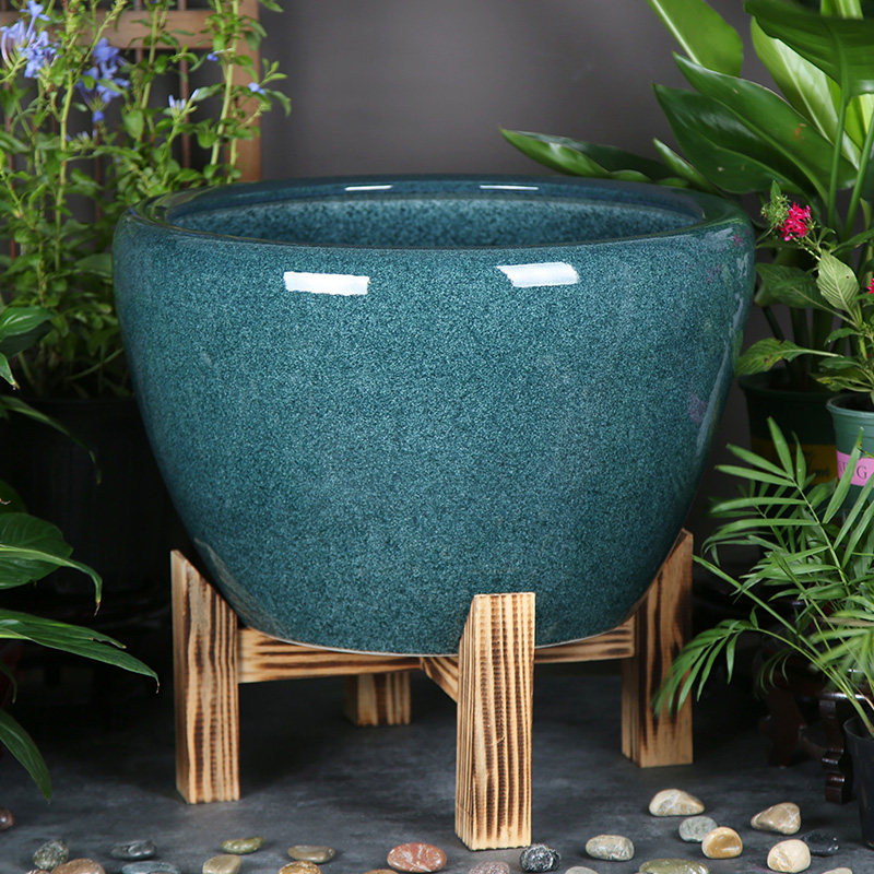 Cilindro profondo verde ghiaccio con base in legno massello
