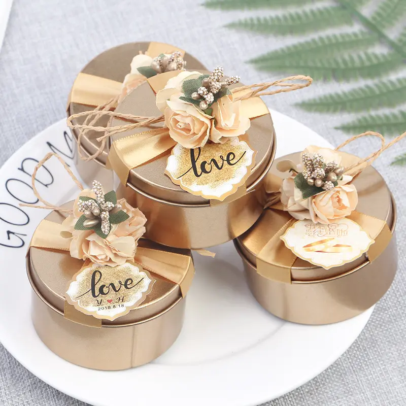 Boîte métallique ronde de luxe en étain pour mariage, cadeau de bonbons, biscuits au chocolat avec ruban et fleur, vente en gros