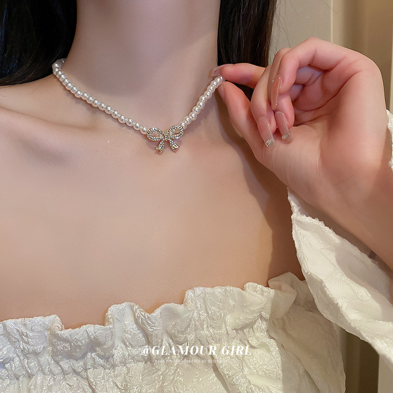 3pearl and diamond bow necklace