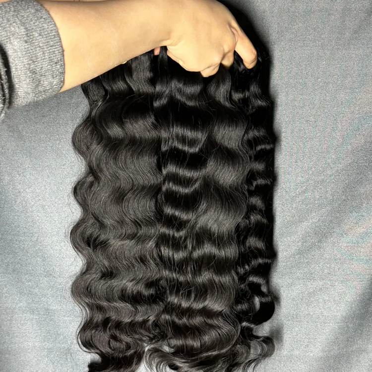 Factory wholesale raw vietnamese hair brazilian virgin natural wave Cambodian wavy human hair bundles