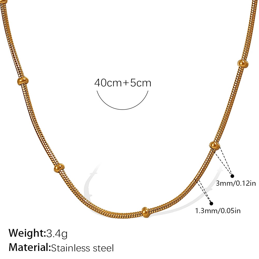 Chaîne de perles en os de serpent doré 1,3mm