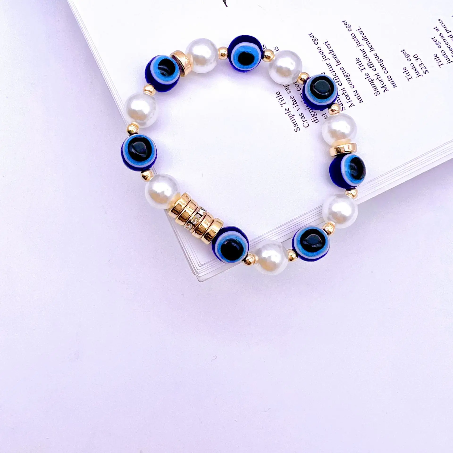 2023 Yi Wu GT nouvelle mode incrusté Zircon turc bleu oeil Bracelet 10MM perle perle chaîne Bracelet pour femme hommes