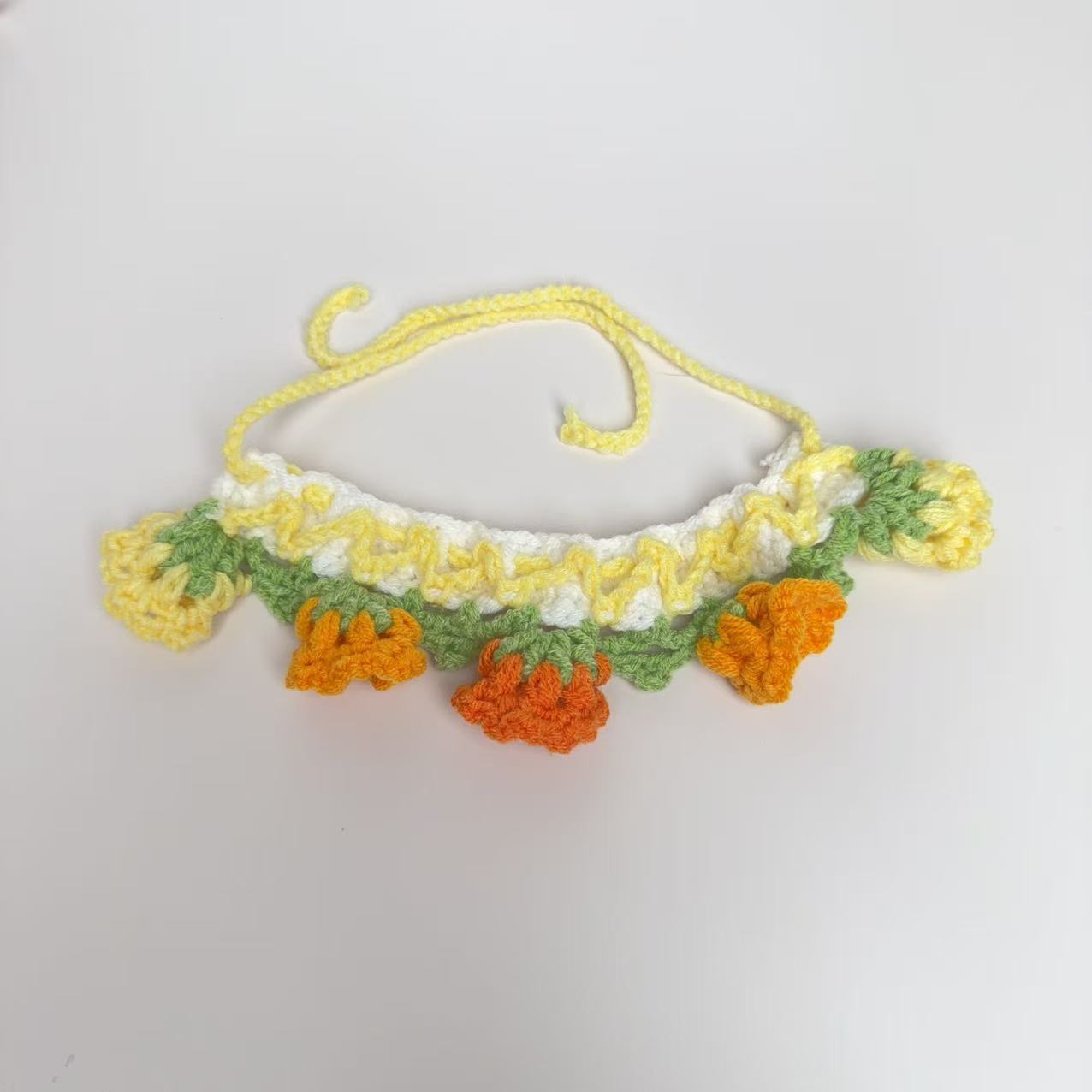 Bavoir muguet jaune