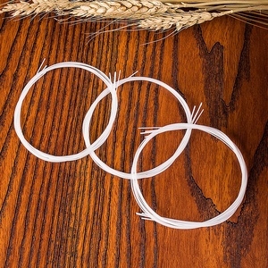 Juego de cuerdas de fábrica de ukeleles y guitarras pequeñas, cuatro cuerdas de nailon para instrumentos de cuerda, empaquetadas en el Reino Unido