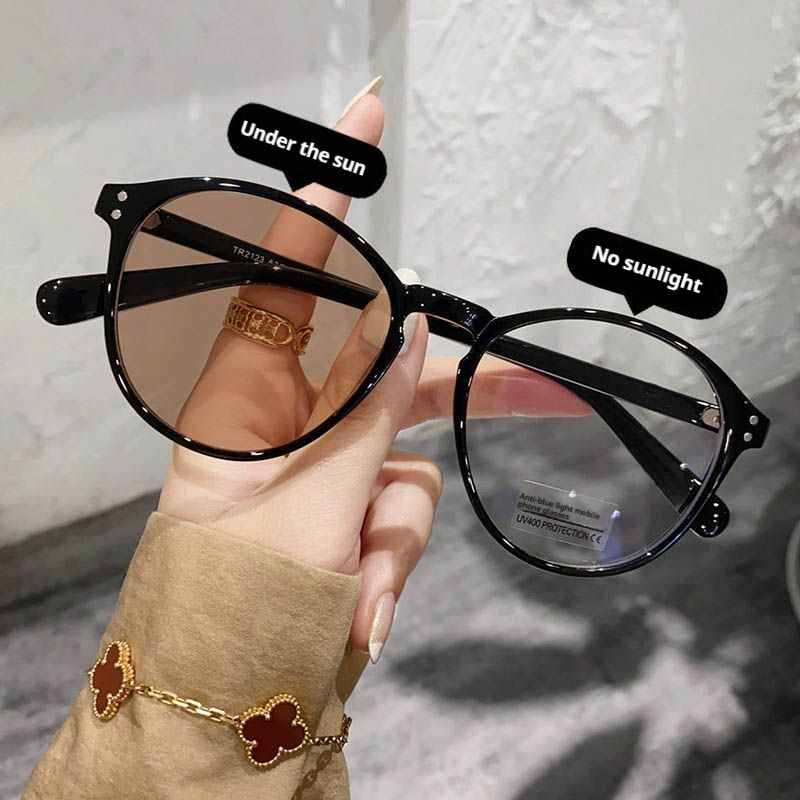 Monture noire lentille photochromique marron