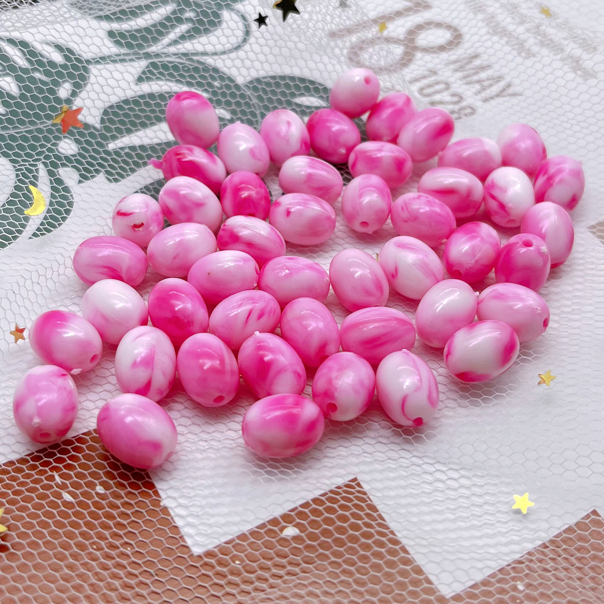 Perles ovales bicolores macaron, rose rouge