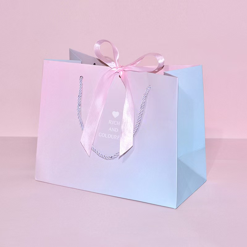 Love is matched with the pink ribbon.