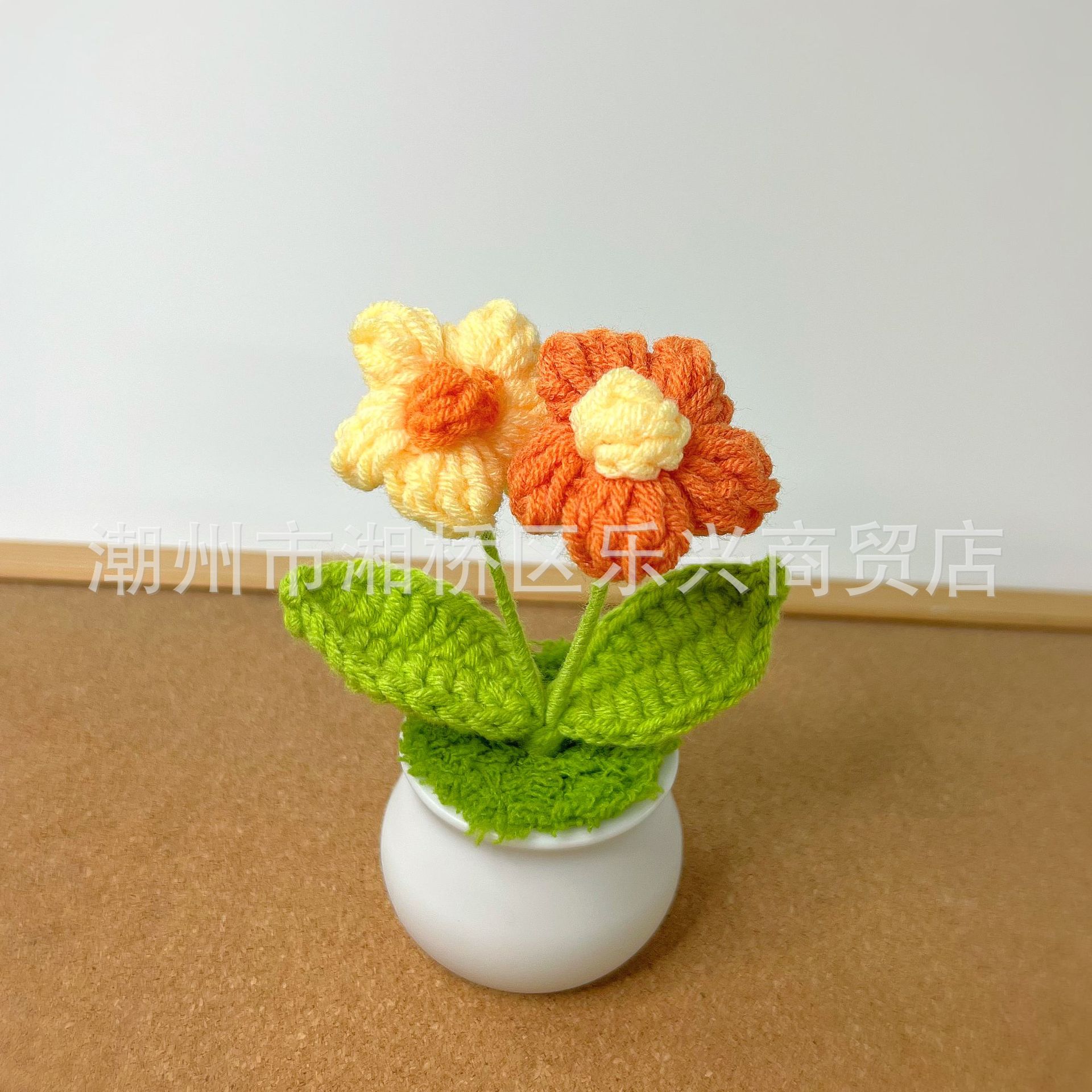 Yellow orange puff flower pot