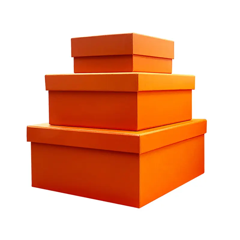 Kotak produk pakaian mewah ukuran logo kustom dengan set tas kertas pita tutup oranye dan kotak hadiah penutup dasar