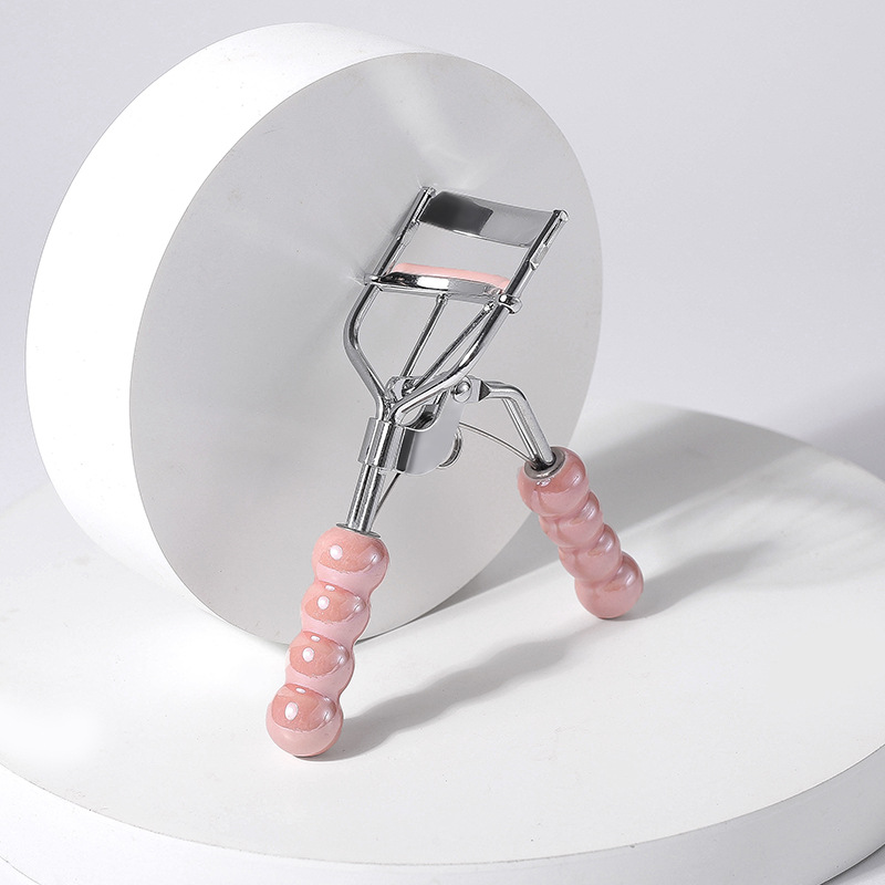 Manche en céramique rose