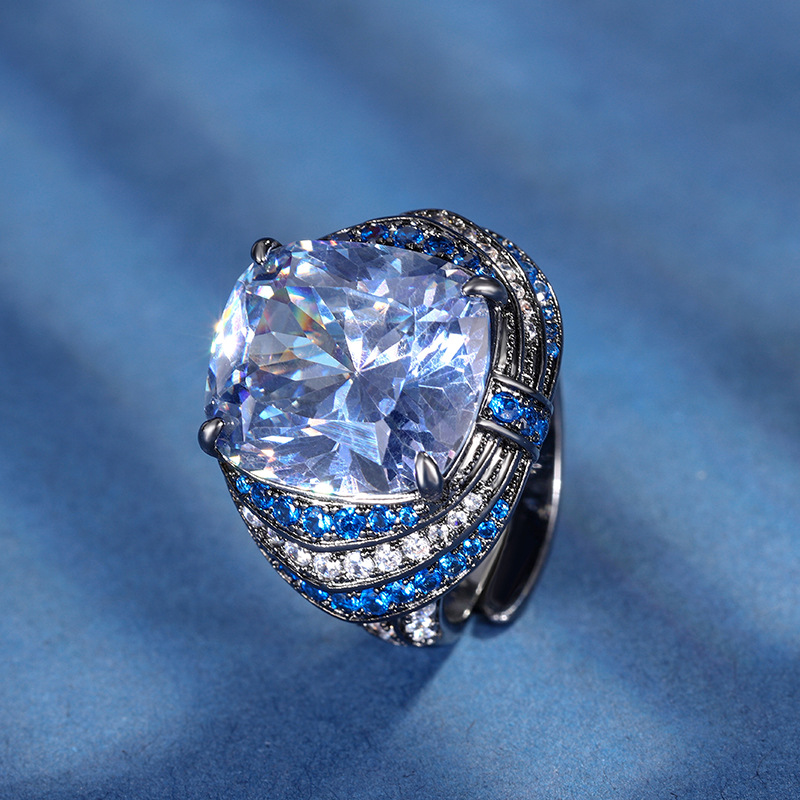 Anillo abierto negro dorado con corte de nido de pájaro, blanco y azul chapado.