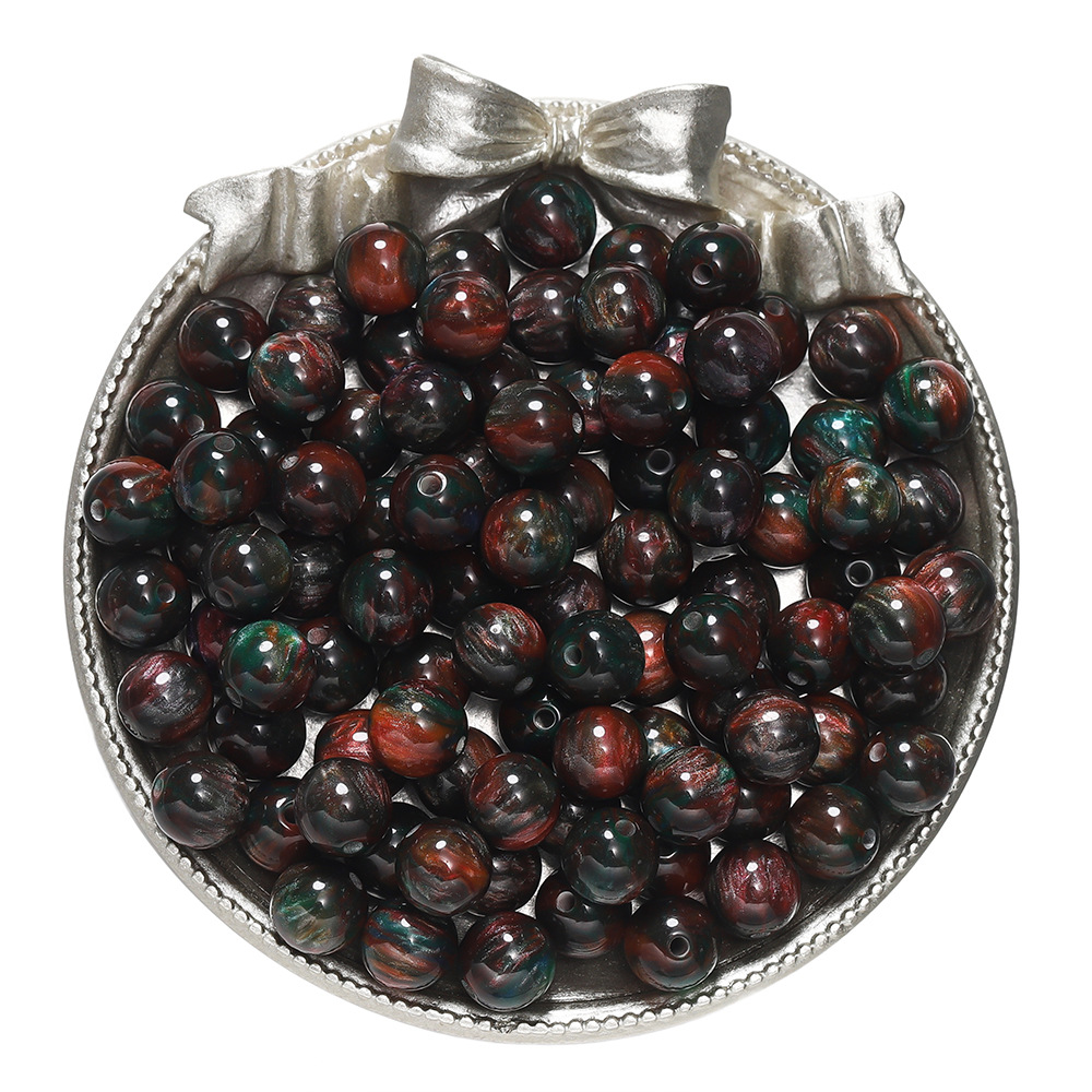 Resin cat's eye beads - red and green