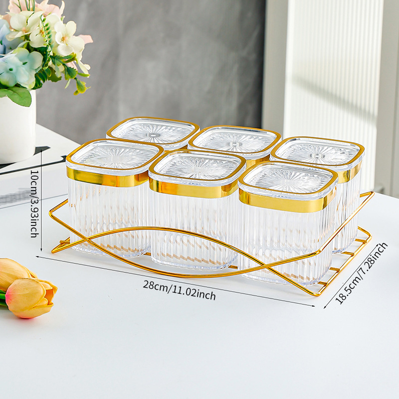 C-shaped transparent gold-rimmed 6-square airtight container