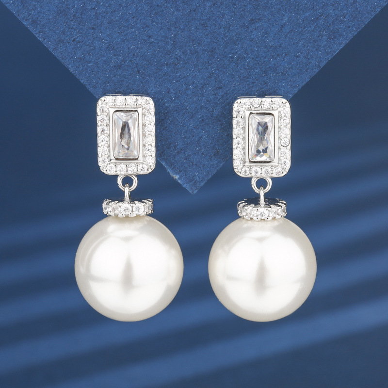 Boucles d'oreilles perles blanches