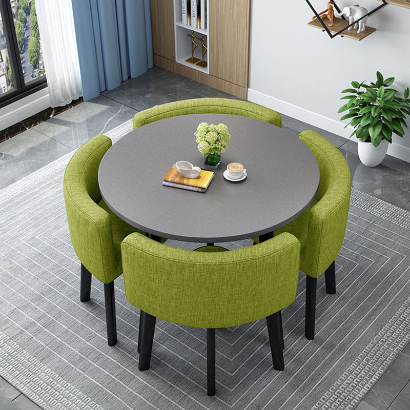 Gray round table + green fabric chairs