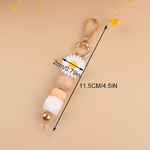 प्यारा डेज़ी फूल सिलिकॉन बेडेड कीचेन बैग बैकपैक आकर्षण कार लटकन महिला उपहार - Product Image 2