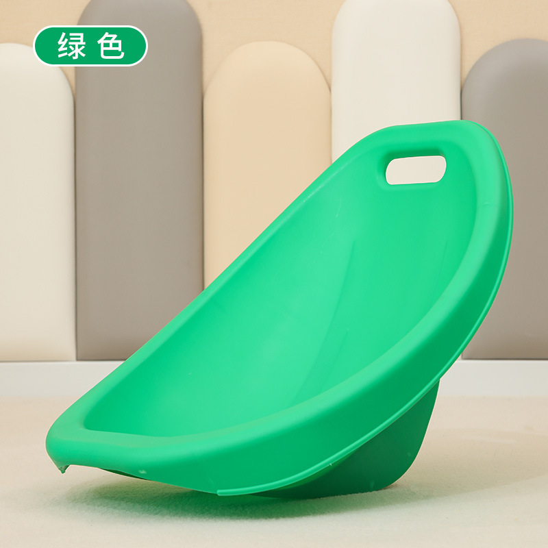 A green sensory integration chair