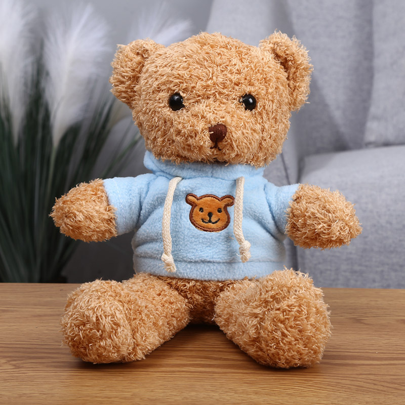Orso giallo con felpa blu