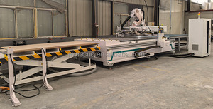 <strong>Auto</strong> <strong>Loading</strong> and <strong>Unloading</strong> Table Wood <strong>Cnc</strong> Machine 1325 ATC <strong>Cnc</strong> Wood Furniture Door Making <strong>Router</strong> Carving Machine