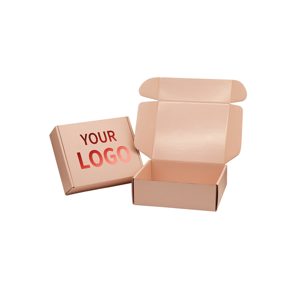 Boîte d'expédition en carton avec logo estampé à chaud rose poudré