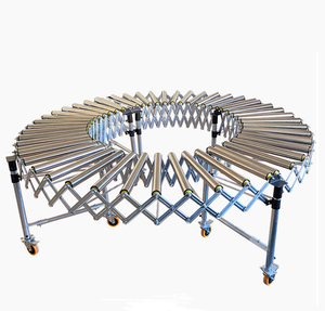 Transportador de rodillos de acero de alta calidad para carga y descarga de contenedores Neumático accionado por potencia para plantas de fabricación