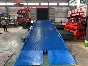 Nivelador de muelle de rampa hidráulica para camiones, capacidad de 6 toneladas a 20 toneladas, puente de embarque y plataforma de contenedores para carga y descarga