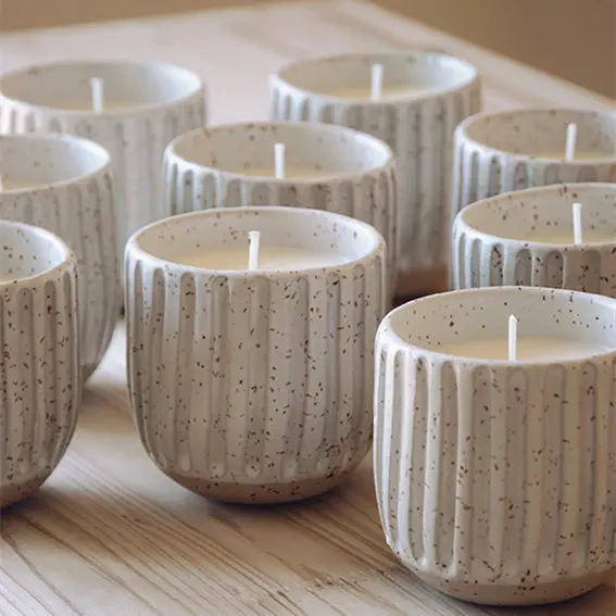 Vasi per candele bianchi con smalto maculato per la decorazione della casa dal design unico vasi per candele vuoti in ceramica personalizzati europei