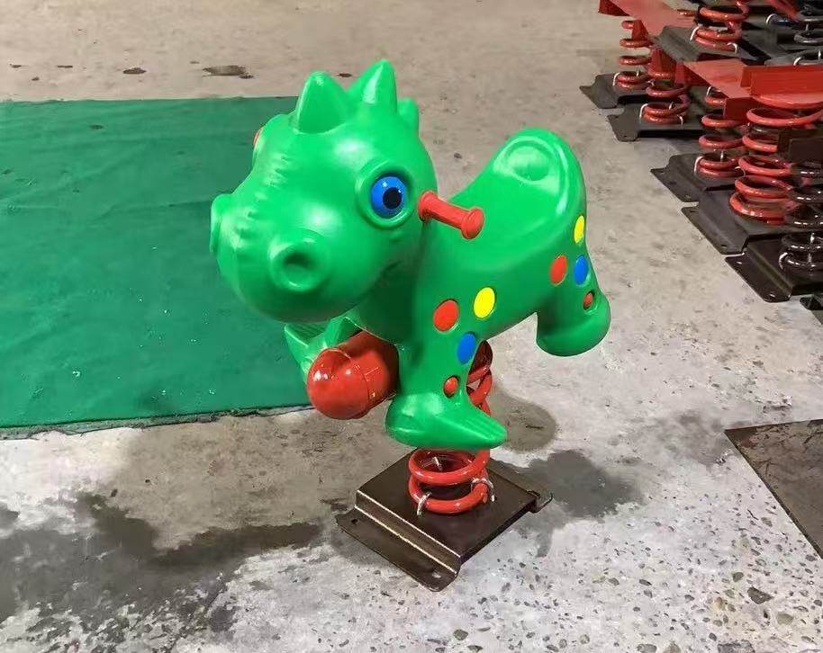 Petit dinosaure rose rouge