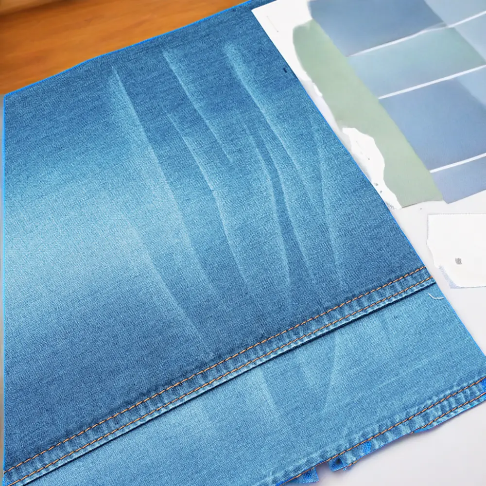2024 nouvelle conception 100% Lyocell 87*64 9oz rigide non extensible bleu foncé Jacquard Denim tissu pour jean de mode