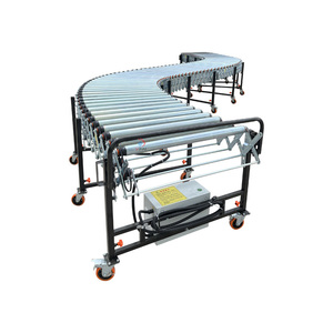 Maximice la eficiencia con sistemas de transportador de rodillos elásticos con ruedas de patín para descarga de carga de contenedores de remolques - Product Image 3