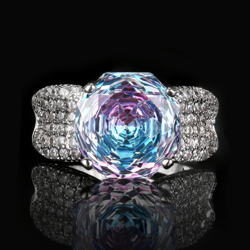 adjustable size Millennium cut pink blue ring