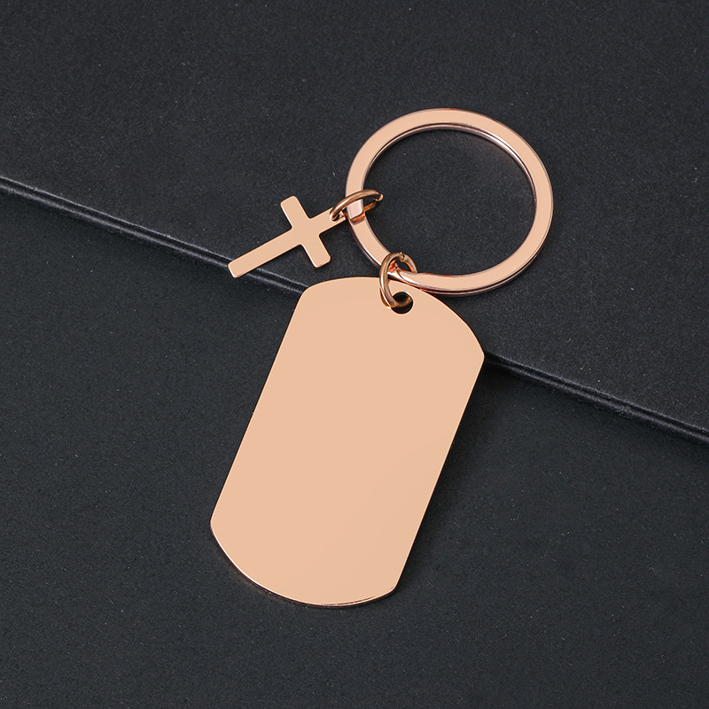 Porte-clés croix 49*28mm - or rose