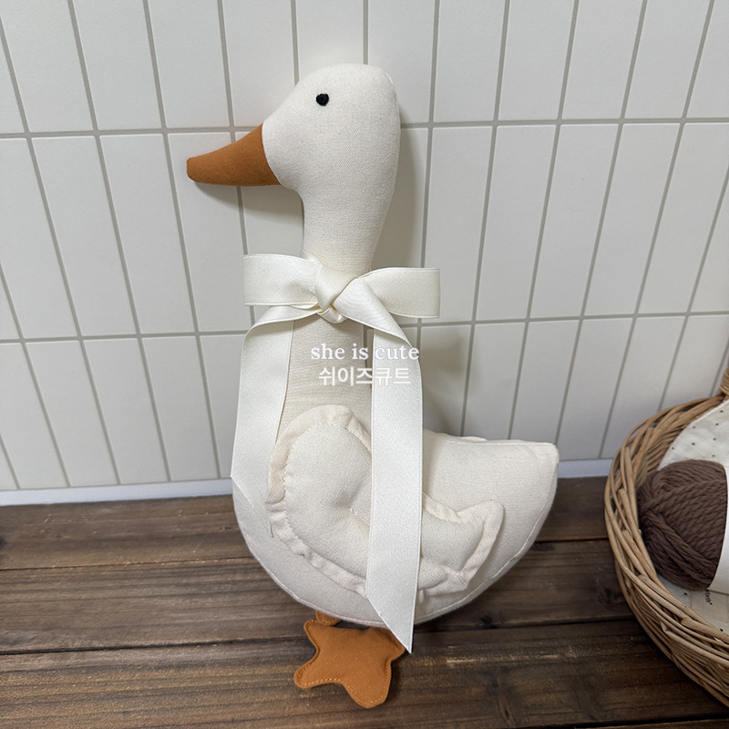 small white swan doll