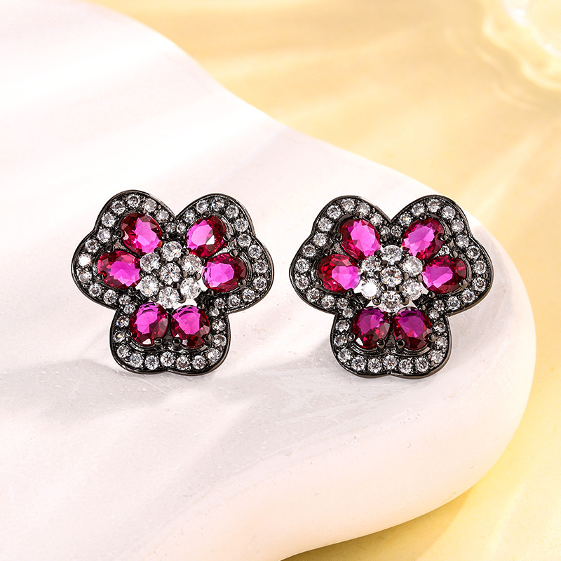 Black Gold red corundum stud earrings