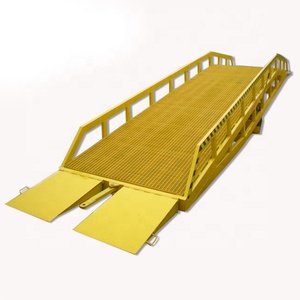 Altura ajustable Carga de carga Descarga Contenedor Muelle Rampa Nivelador de muelle móvil para camión/contenedor