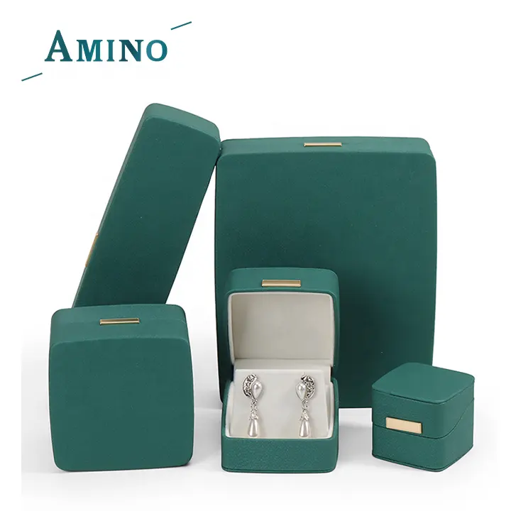 Amino แฟชั่นสีเขียวเข้มเครื่องประดับหนัง PU แหวนแบบฝาพับต่างหูสร้อยคอมุกสร้อยข้อมือหยกเครื่องประดับกล่องของขวัญ