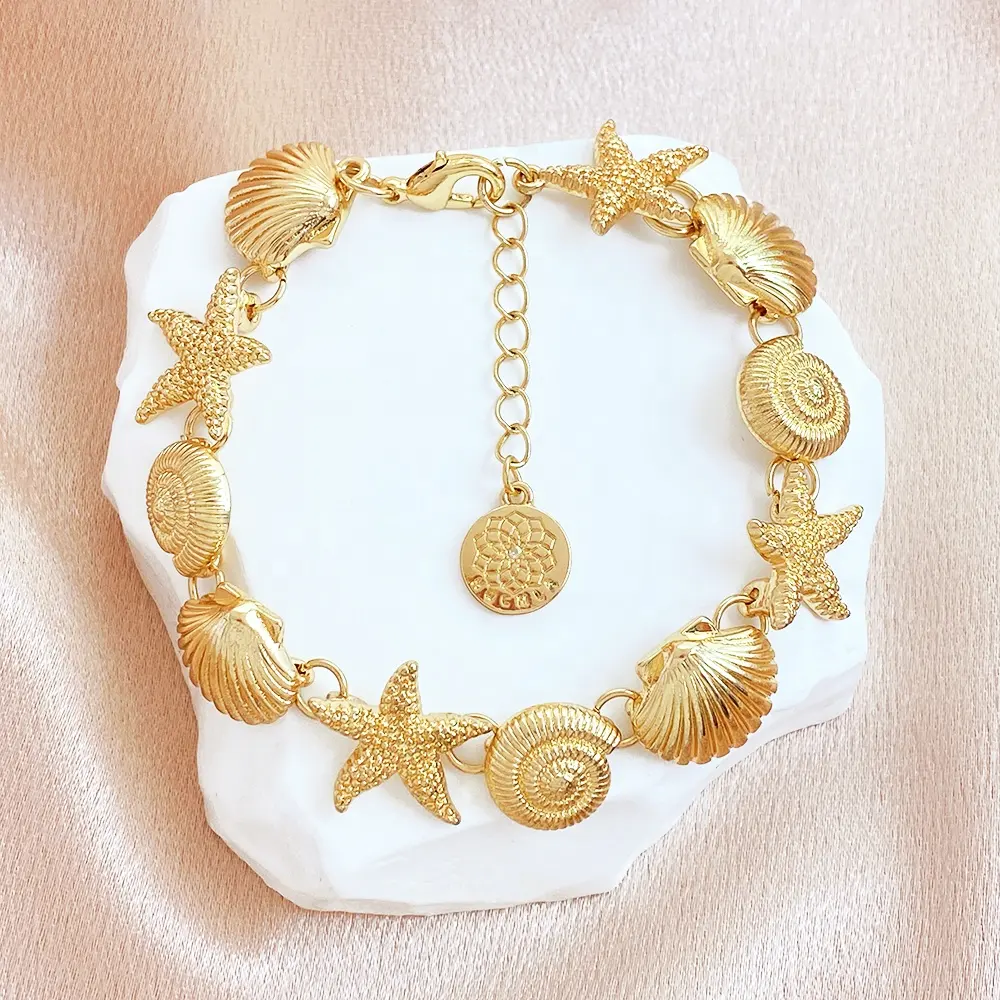 Pulseras chapadas en oro con forma de concha de estrella de mar para mujeres y niñas, joyería al por mayor