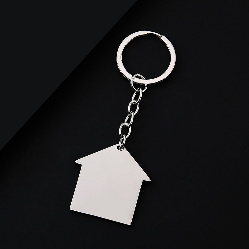 Porte-clés argenté avec trou de 38377 mm pour maison.