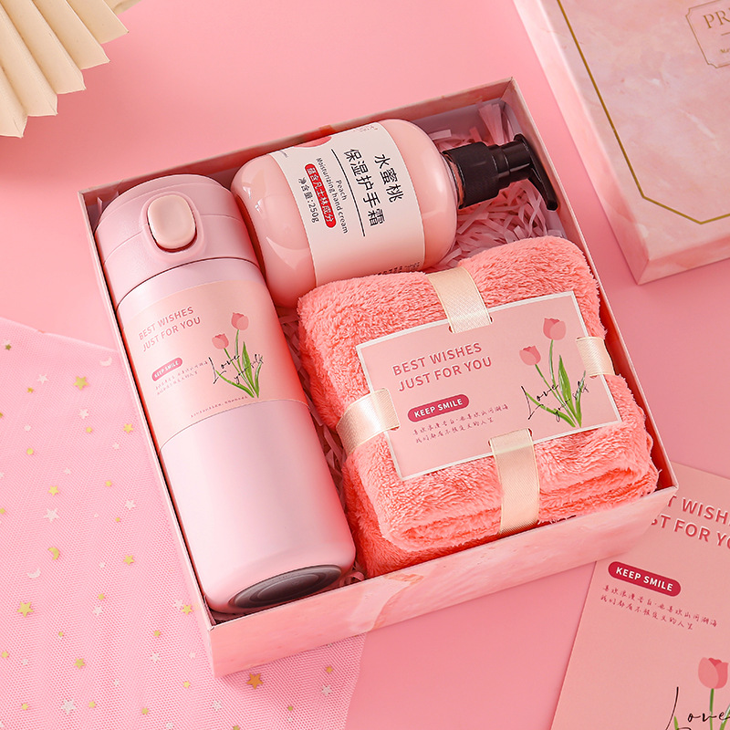 thermos cup + hand cream + towel