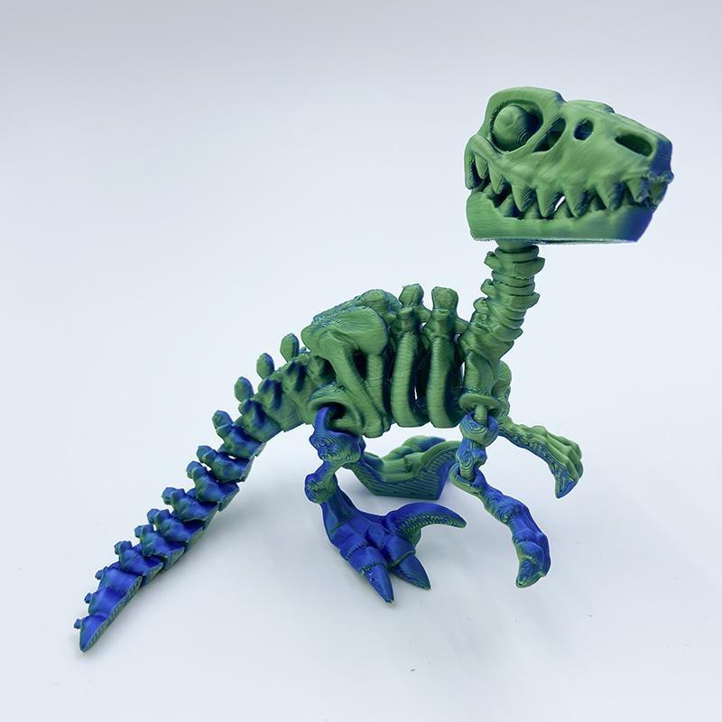 มังกรแร็พเตอร์สีเขียวอมฟ้ายาว14ซม.