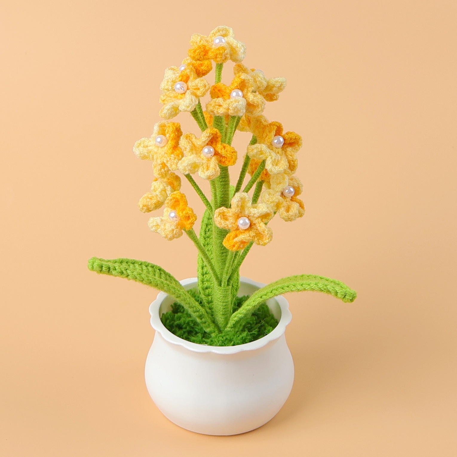 Plante en pot de gypsophile jaune teintée Duan - pot blanc